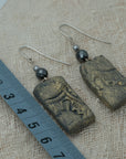 Handmade clay earrings with hematite