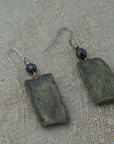 Handmade clay earrings with hematite