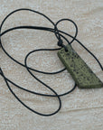Unisex black - green pendant with clay