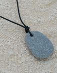 Unisex pendant with pebble