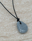 Unisex pendant with pebble