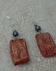 Handmade clay earrings with hematite