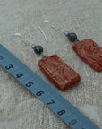 Handmade clay earrings with hematite