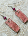 Clay earrings in red iridescent shades