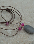 Grey sea pebble pendant with agate
