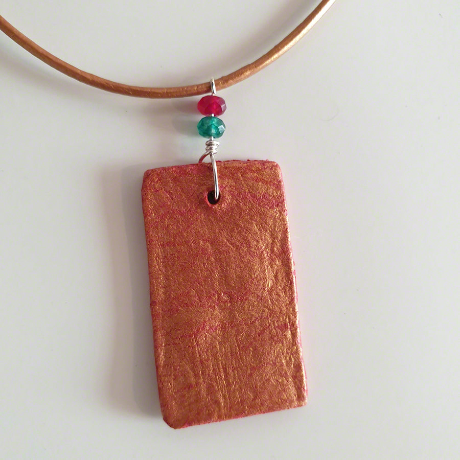 red gold clay pendant with agate