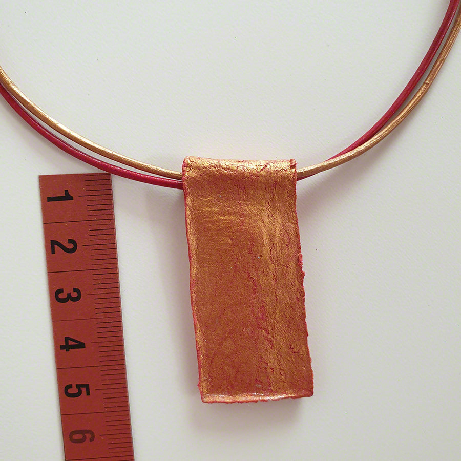 handmade red gold clay pendant