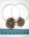 silver hoop earrings with crochet flower