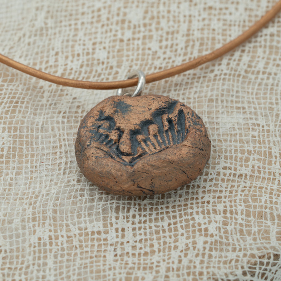 Handmade clay pendant