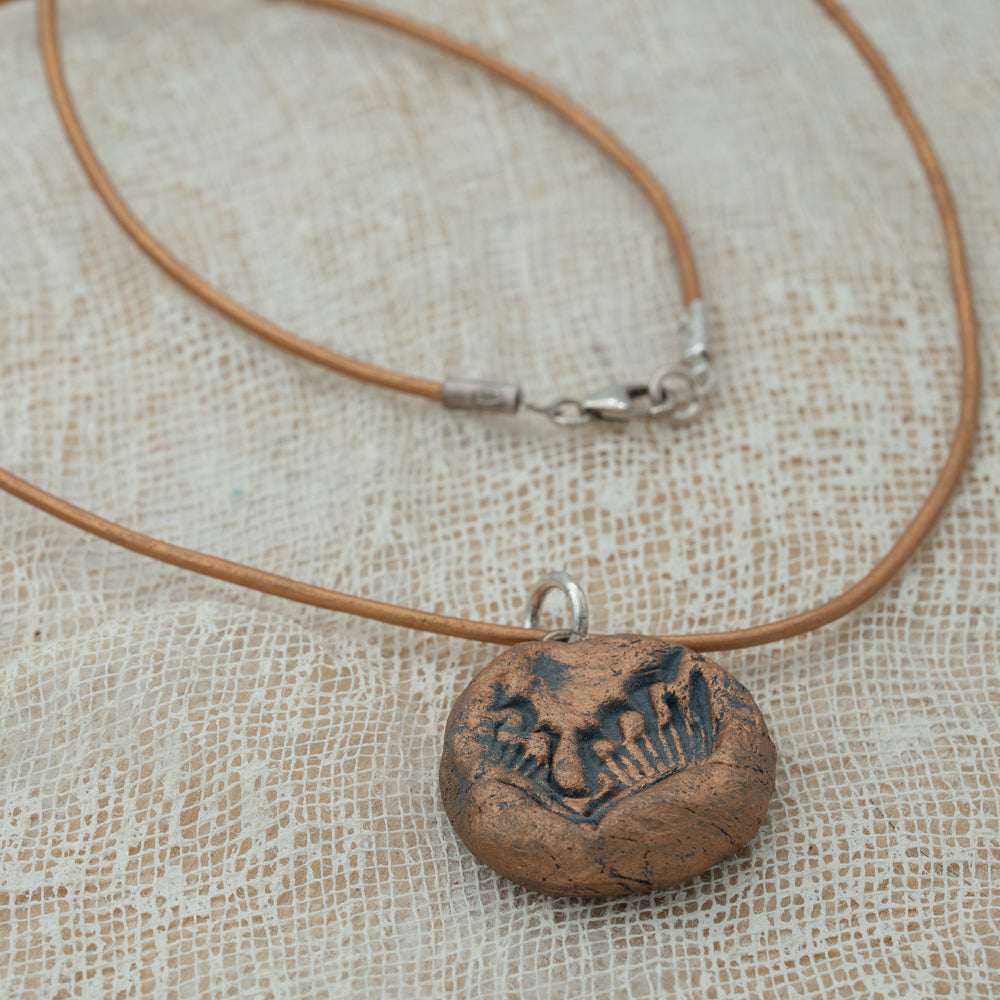 Handmade clay pendant