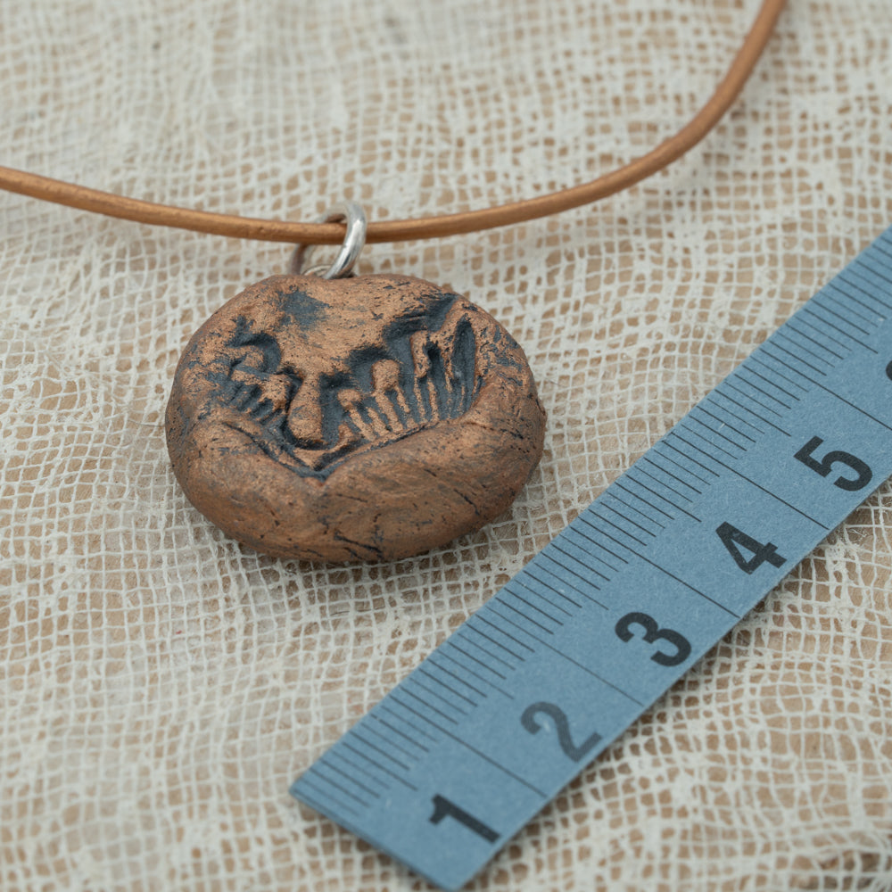 Handmade clay pendant