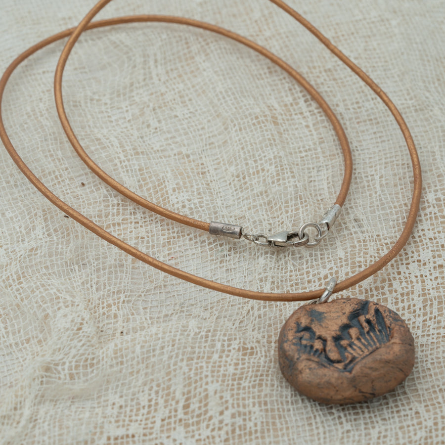 Handmade clay pendant