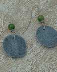 Handmade earrings with smooth round pebbles, accented with green agate and hematite beads on silver hooks.