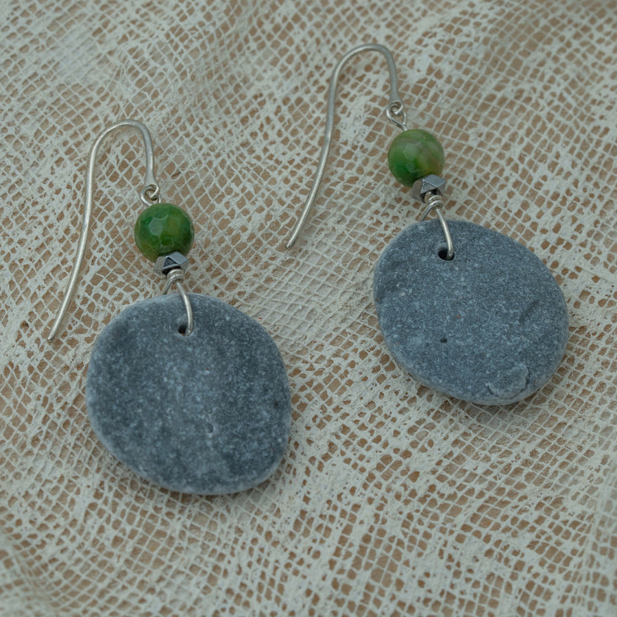 Handmade earrings with smooth round pebbles, accented with green agate and hematite beads on silver hooks.