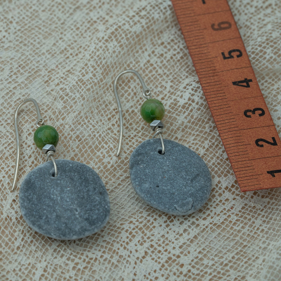 Handmade earrings with smooth round pebbles, accented with green agate and hematite beads on silver hooks.