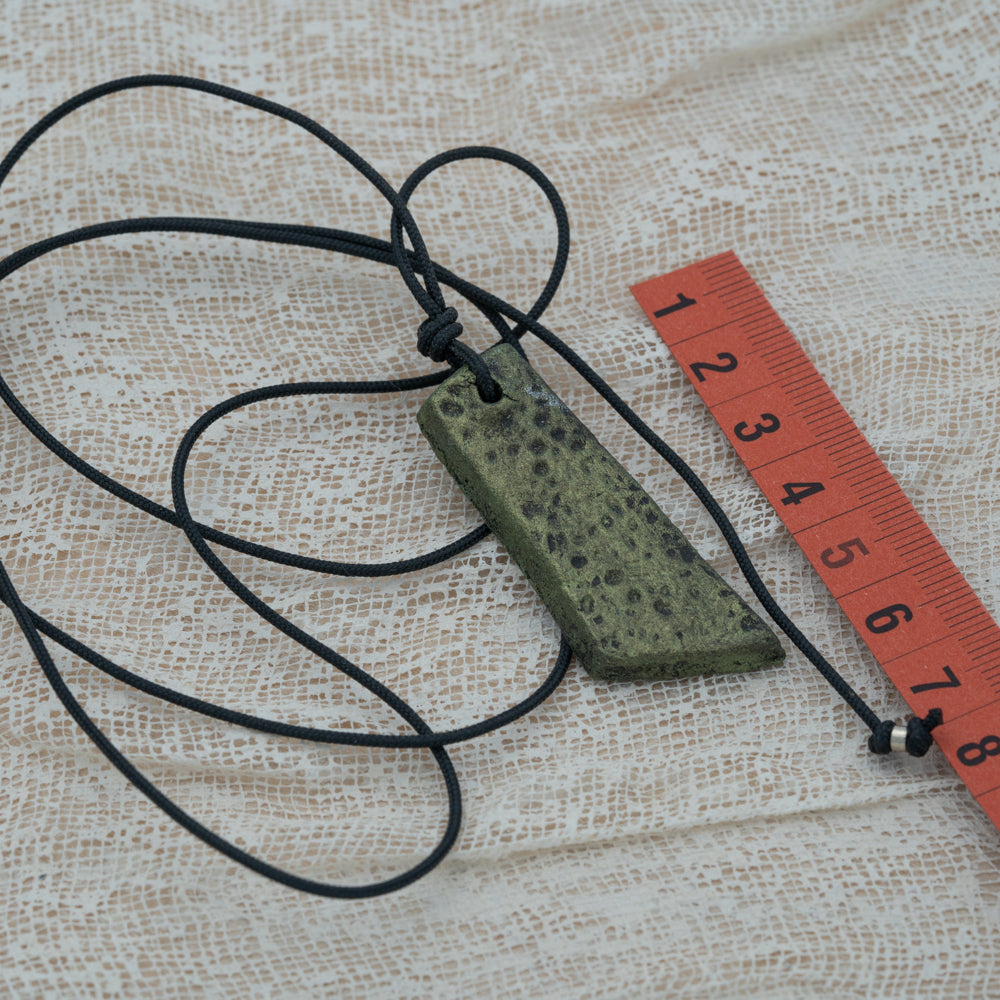 Unisex black - green pendant with clay