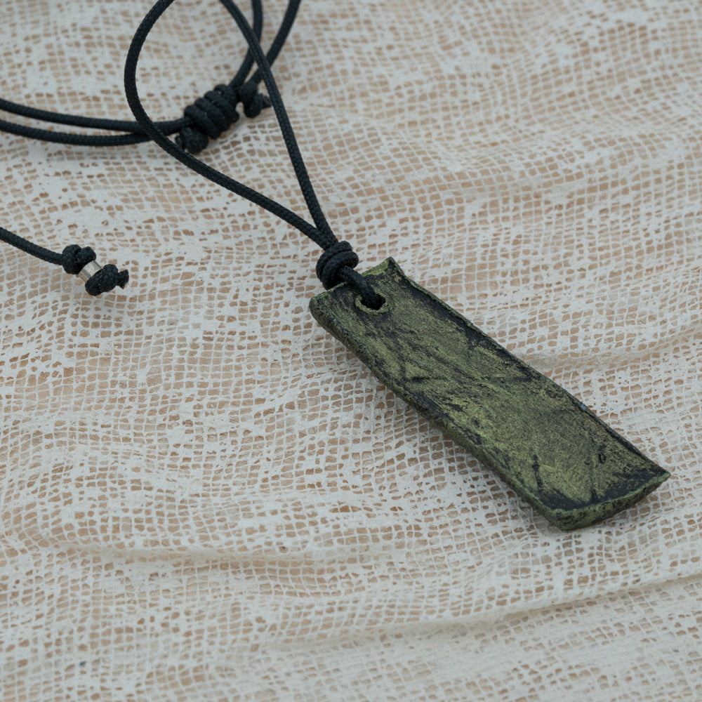 Unisex black - green pendant with clay