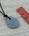 Unisex pendant with pebble
