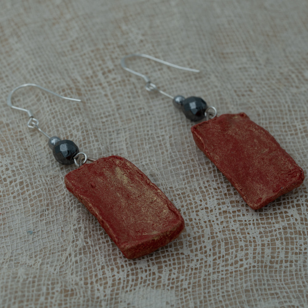 Handmade clay earrings with hematite