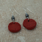 Handmade red clay earrings with hematite