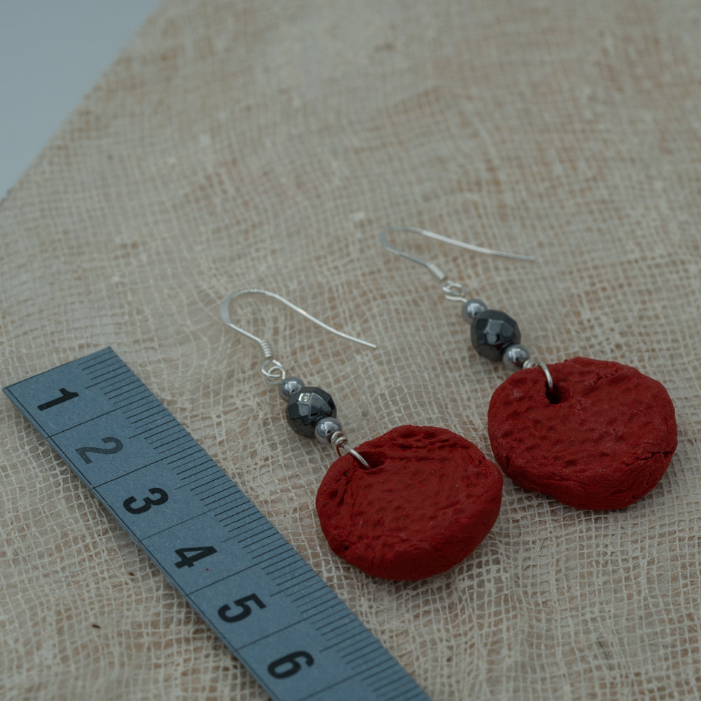 Handmade red clay earrings with hematite