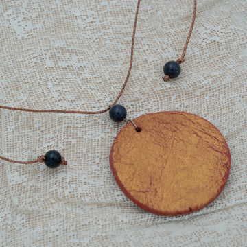 red gold agate clay pendant with goldstone
