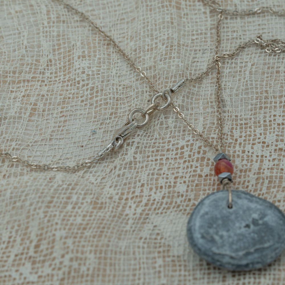 Sea pebble pendant with silver chain