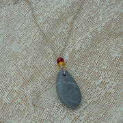 Sea pebble pendant with silver chain