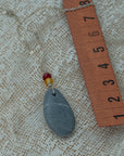 Sea pebble pendant with silver chain