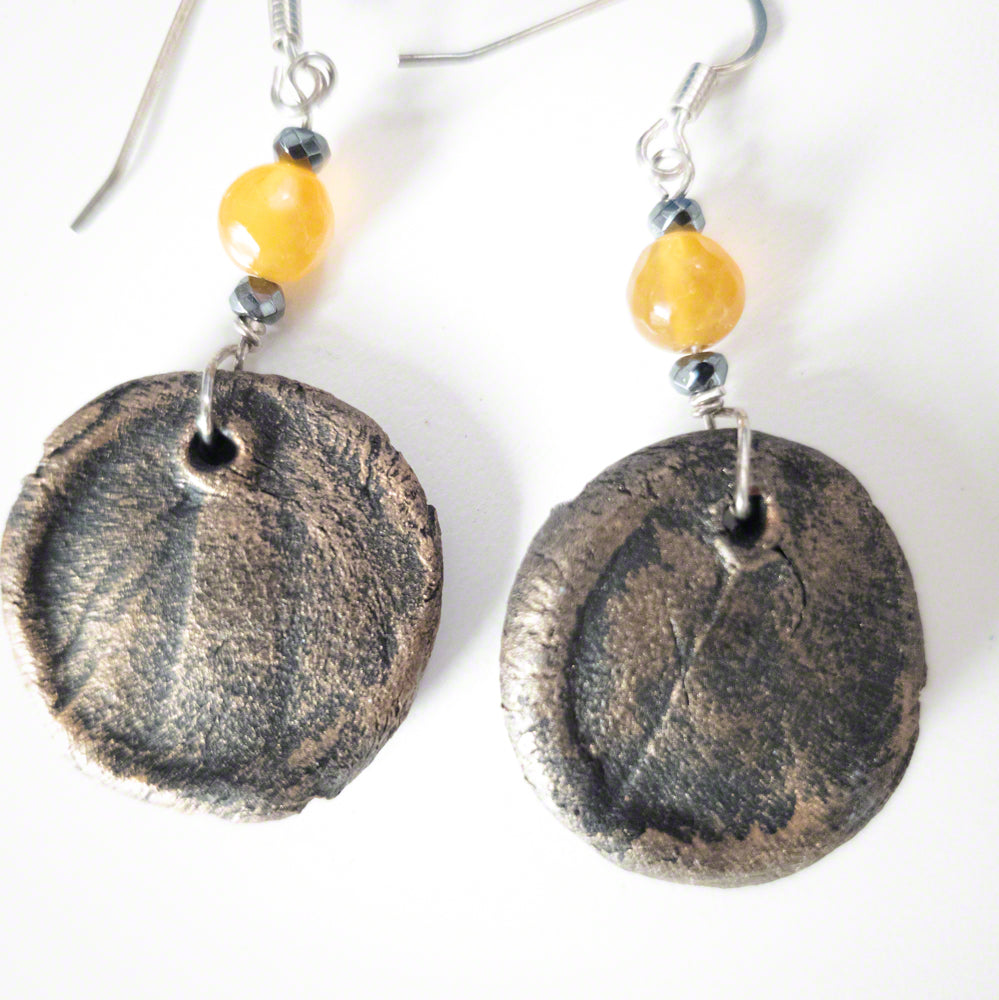 handmade black gold clay earrings