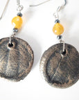 handmade black gold clay earrings