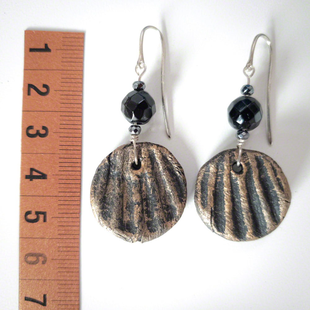 black gold clay earrings