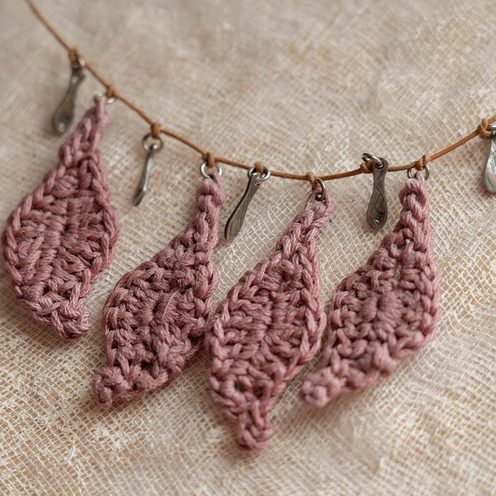 handmade crochet pendant with leaves