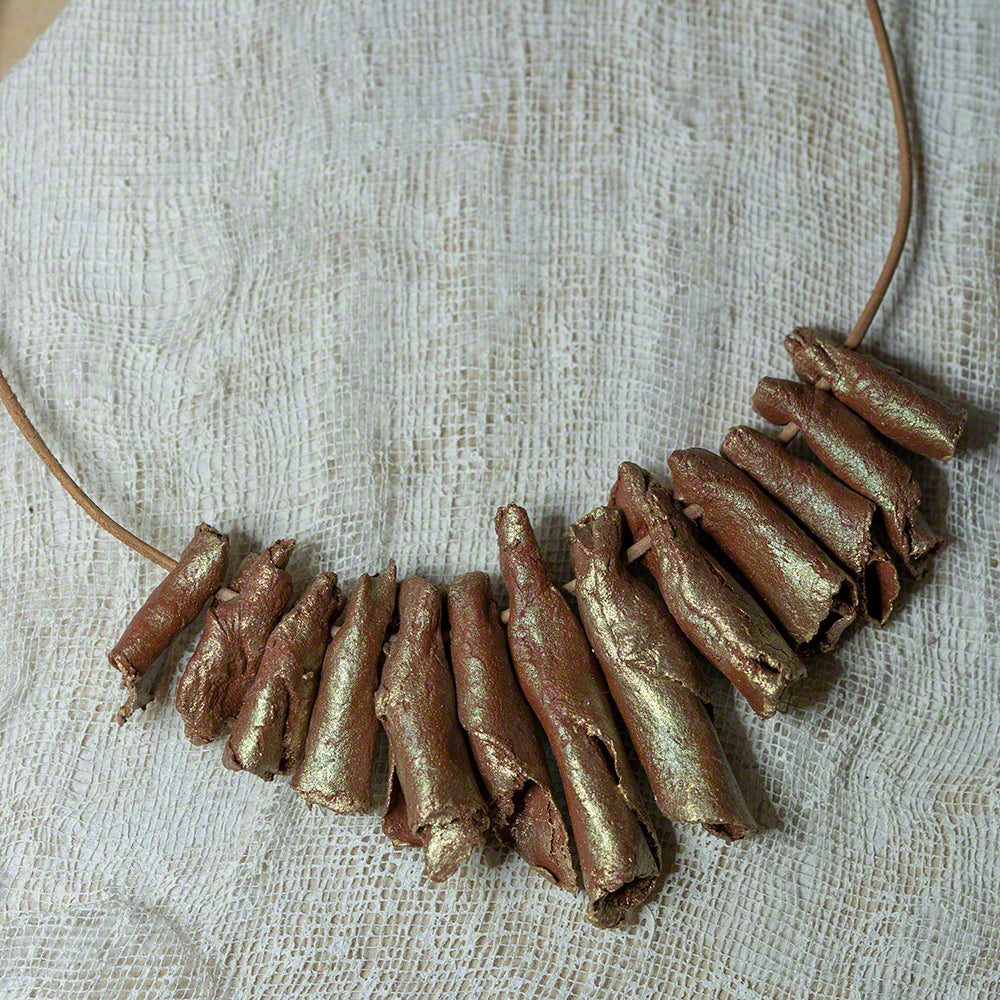 handmade gold iridiscent clay nacklace