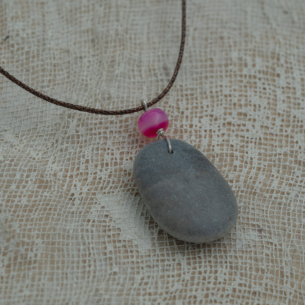 Grey sea pebble pendant with agate