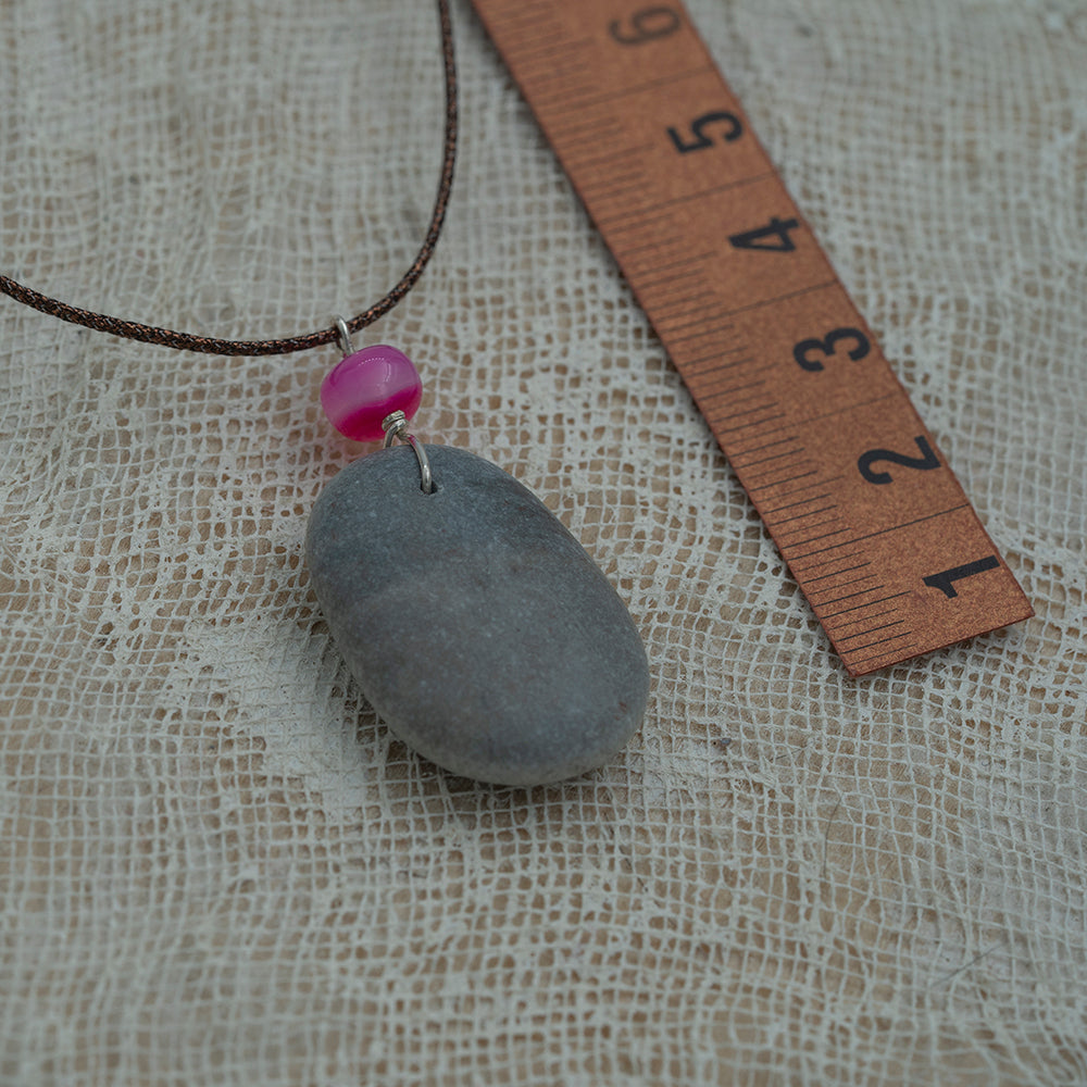 Grey sea pebble pendant with agate