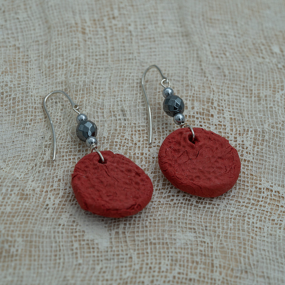 Handmade red clay earrings with hematite