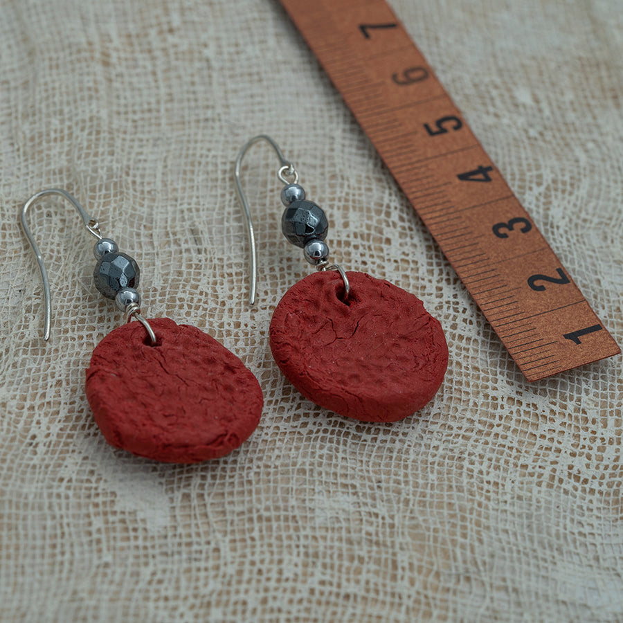 Handmade red clay earrings with hematite