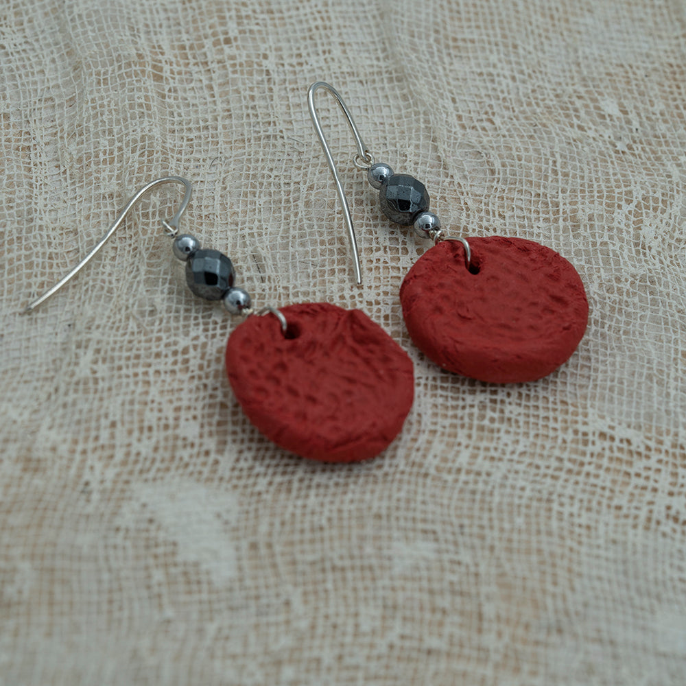 Handmade red clay earrings with hematite