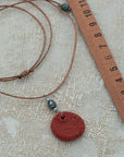 red clay pendant