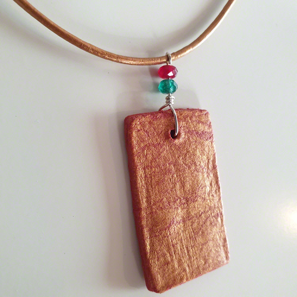 red gold clay pendant with agate