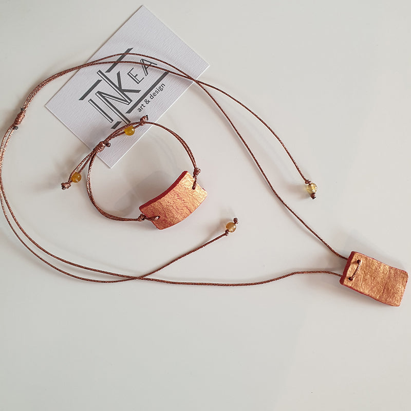 Handmade red-gold clay pendant - bracelet