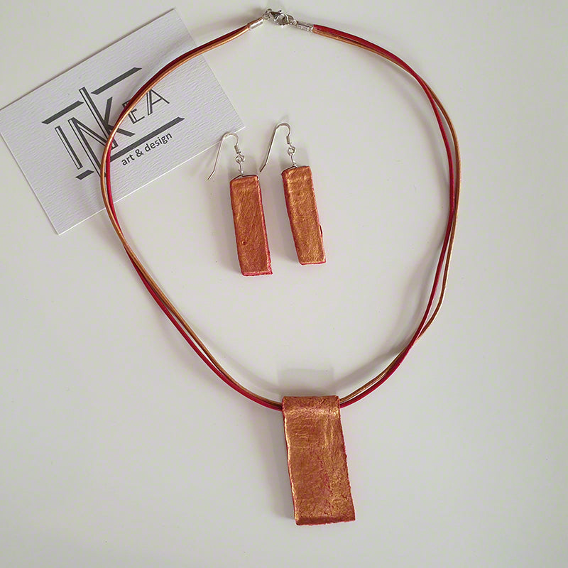 handmade red gold clay pendant